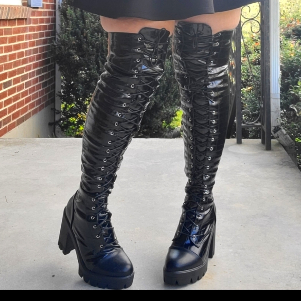 Knee high lace up black boots
